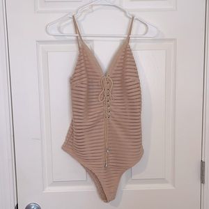 Dusty pink/ nude ribbed & striped body suit